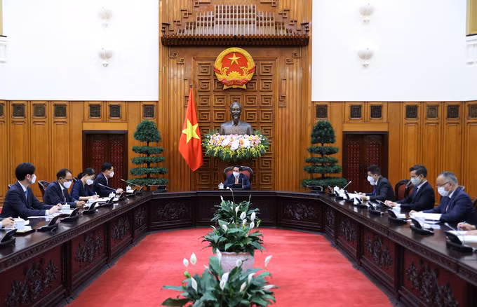越南政府总理范明政会见韩国外交部长官郑义溶 ảnh 2