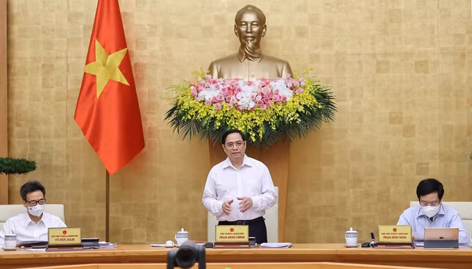 越南政府总理范明政主持政府6月例行会议 ảnh 1