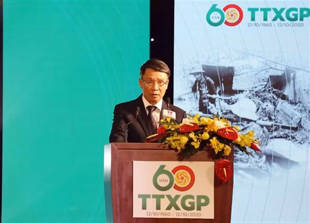 解放通讯社成立60周年纪念典礼暨“人民武装力量英雄”称号颁授仪式隆重举行 ảnh 3