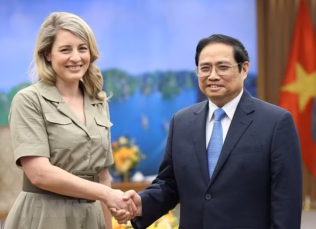 越南政府总理范明政会见加拿大外长梅兰妮·乔利女士 ảnh 1
