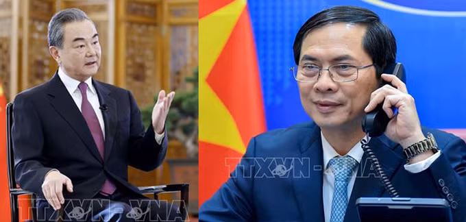 越南外交部长裴青山同中国外长王毅通电话 ảnh 1