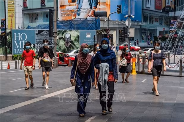 马来西亚保证不再为防疫而封锁经济领域 ảnh 1