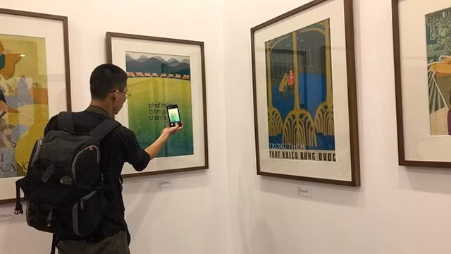 宣传画展开展仪式暨“渴望和平” 一书亮相仪式 ảnh 1
